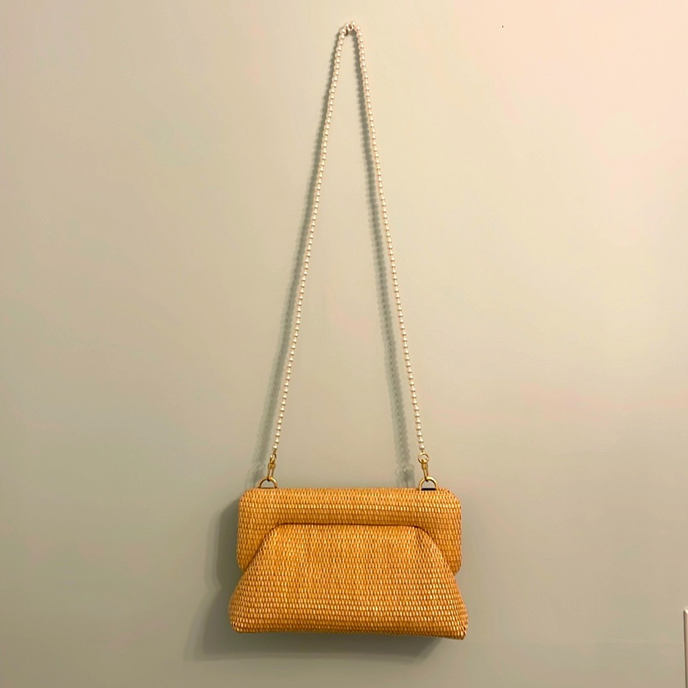 A new day straw crossbody bag. Never used.